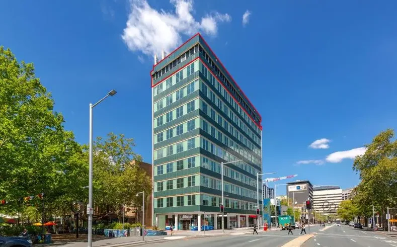 161 London Circuit, a ten-storey building on a tree-lined street in Canberra's city centre